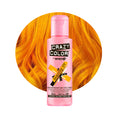 Indlæs billede i Gallery viewer, Den lyserøde flaske Crazy Color Hårfarve Anarchy UV (100 ml) står mod levende orange hår, klar til at udløse sin neonmagi.
